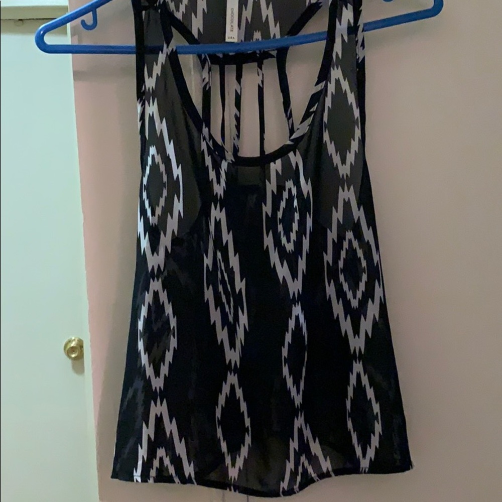 Woman’s black see-through shirt